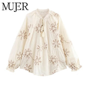 Blusas bordadas con flores