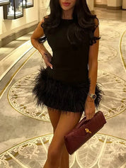 Vestidos corto de plumas negras