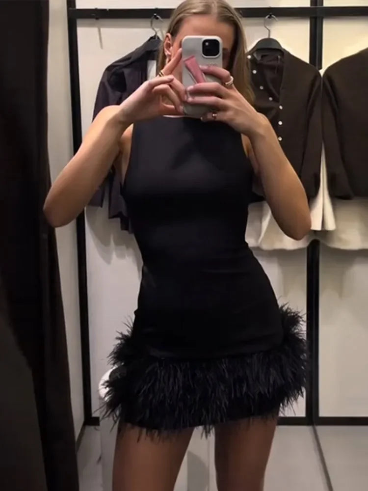Vestidos corto de plumas negras
