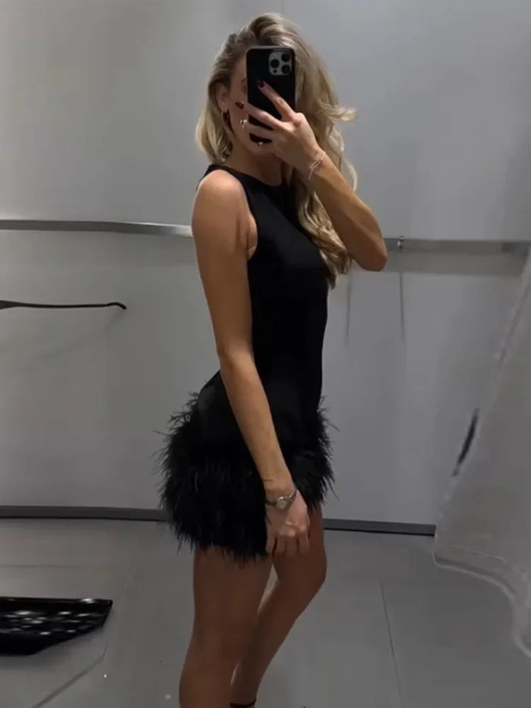 Vestidos corto de plumas negras